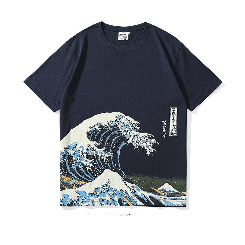 Navy t-shirt with an ocean wave illustration on the lower front, flat lay, front view
