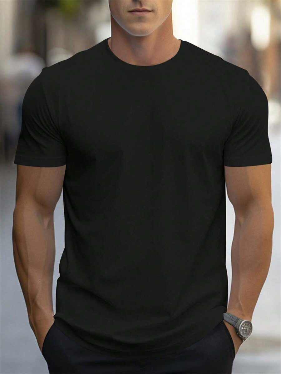 Black plain crew-neck t-shirt, worn by a model, front view