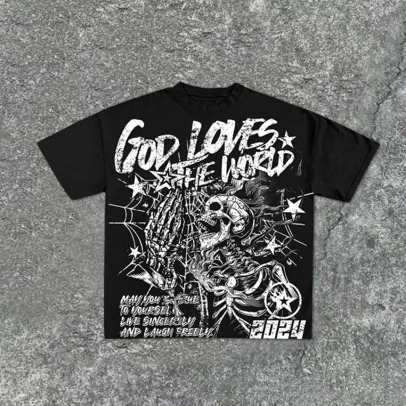 Black oversized t-shirt with a skeleton and cobweb graphic on the chest, flat lay, front view