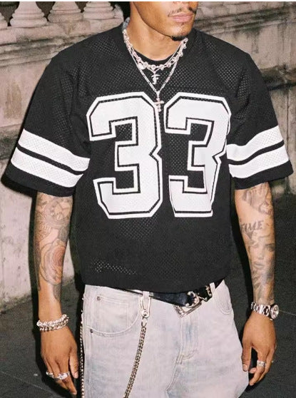 Black mesh sports t-shirt with a large number 33 and sleeve stripes, worn by a model, front view