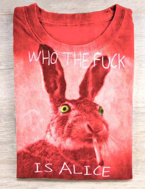 Red t-shirt with a rabbit portrait graphic and printed text, folded, front view
