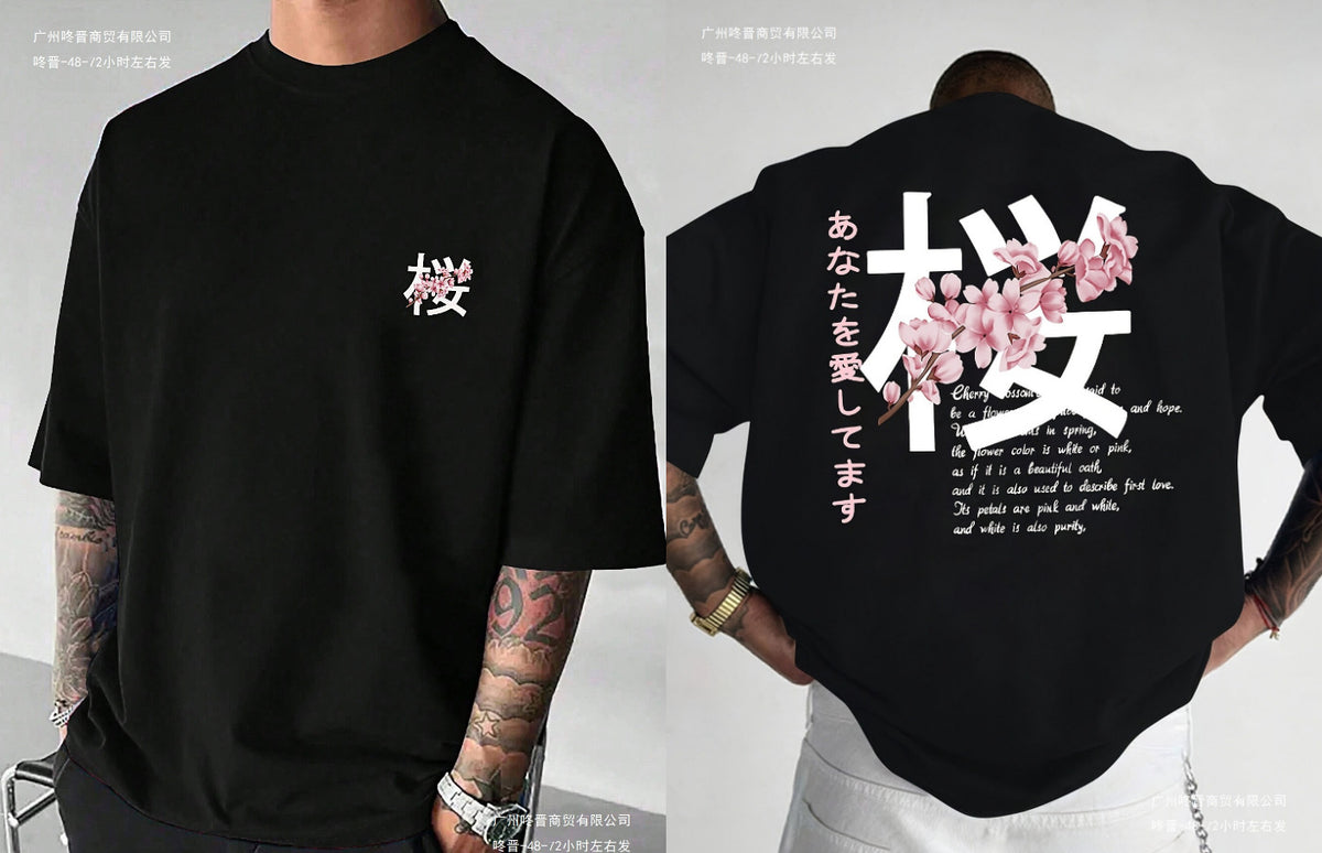 Black loose t-shirt with a cherry blossom graphic on the back, front and back view